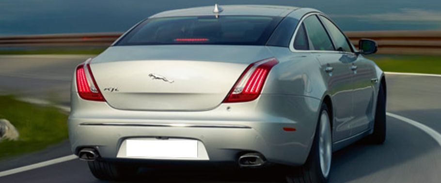 XJ Premium Luxury LWB Rear angle view