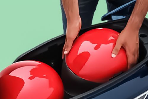 TVS iQube Seat Storage Side View